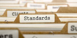 Standards Setting, Standards Development and Division of the Gains from Standardization